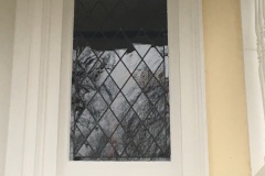 Restored glass beside main door